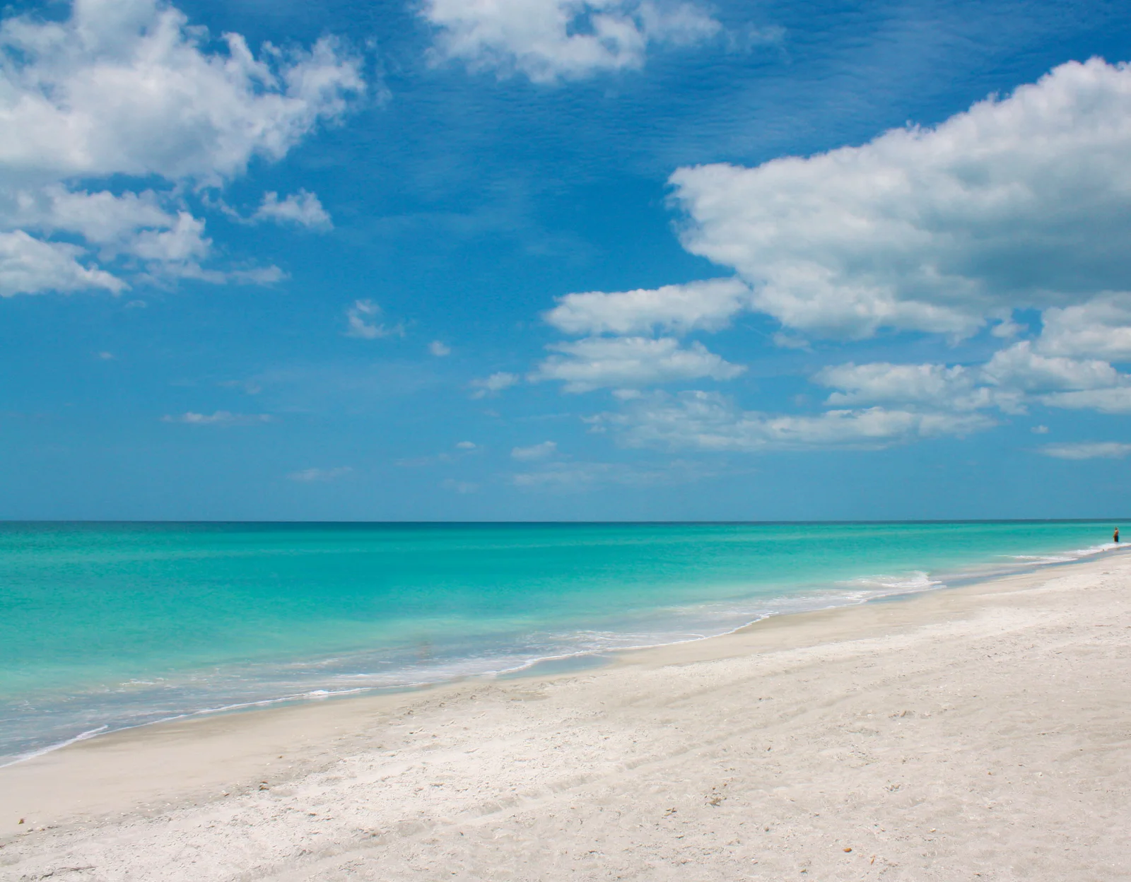 Turquoise Gulf water and white sand on Longboat Key