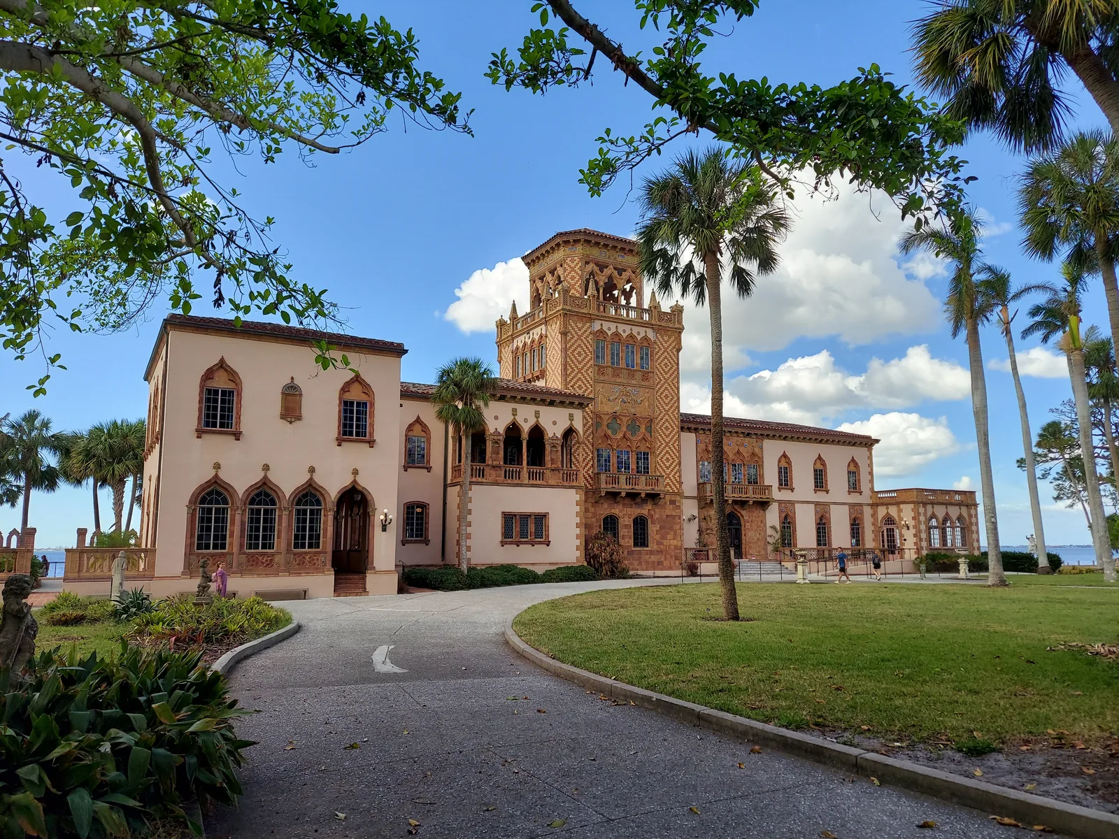Ca’ d’Zan mansion framed by trees and palms on the Ringling estate in Sarasota